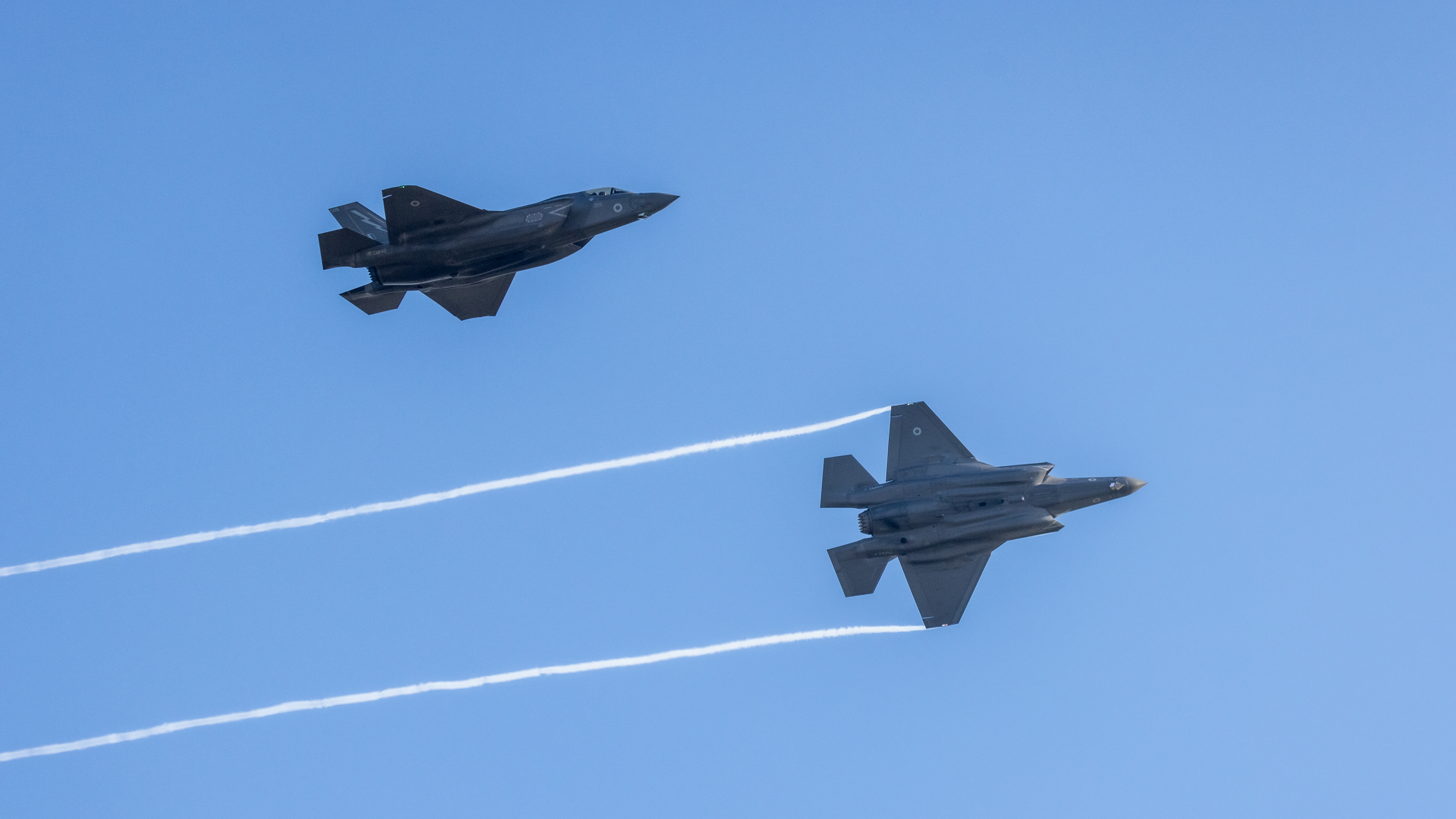 Image shows two RAF Lightning aircraft during flypast.